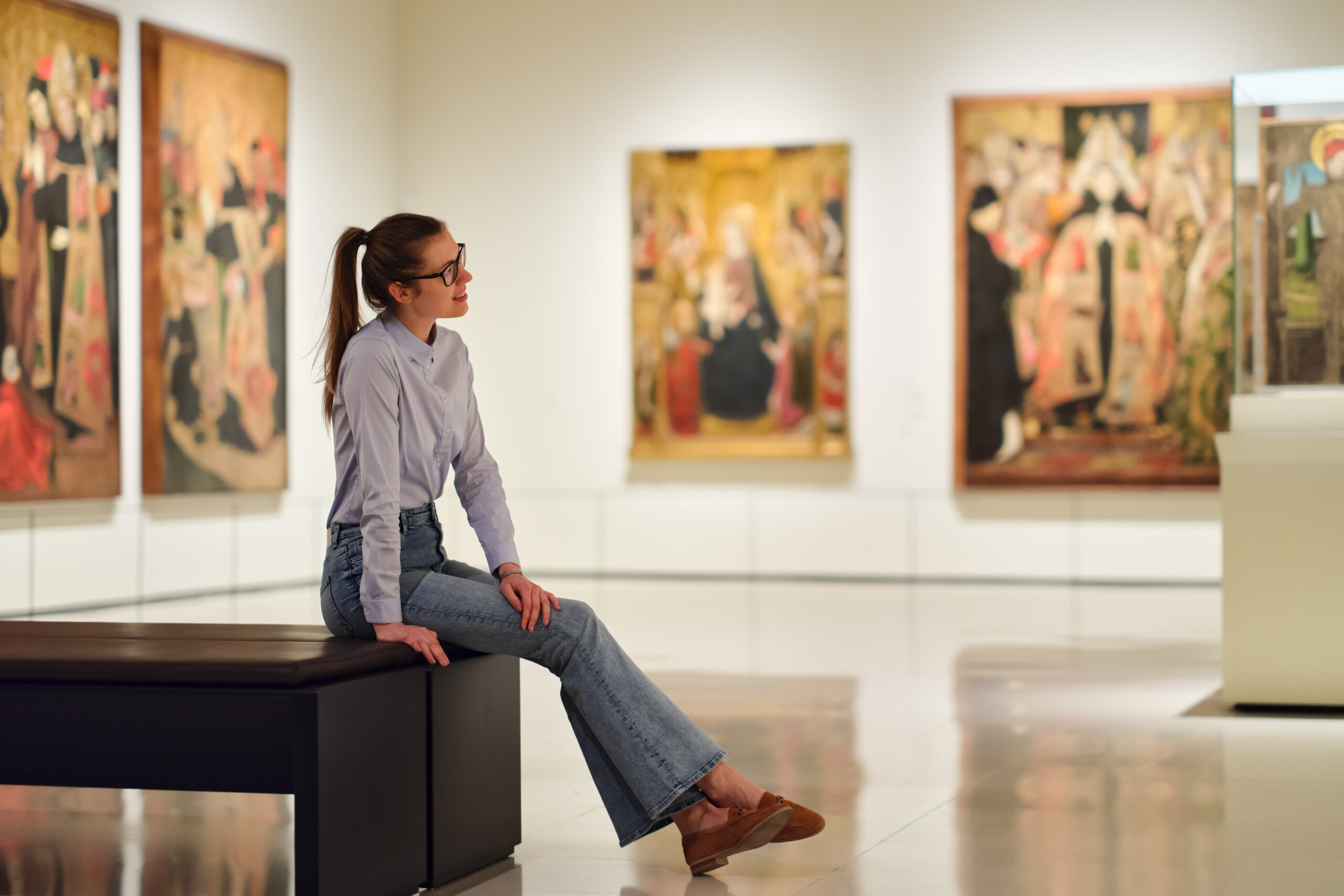 Museum-goer viewing art exhibition