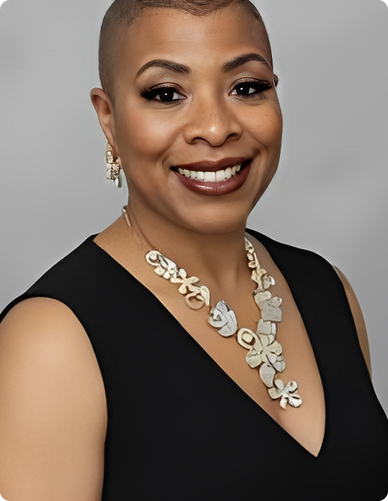 Smiling woman with statement necklace and black dress